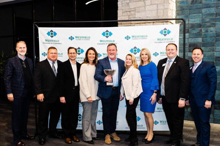 (from left) Community First Bank’s Bob Hickman, Robb Blume, Jeff Magginnis, Janelle Campbell, Scott Hammersley, Adrienne Riddle, and Bonnie Riley accepting the Large Business of the Year award from Westfield Chamber’s Steve Latour and Steve Rupp.