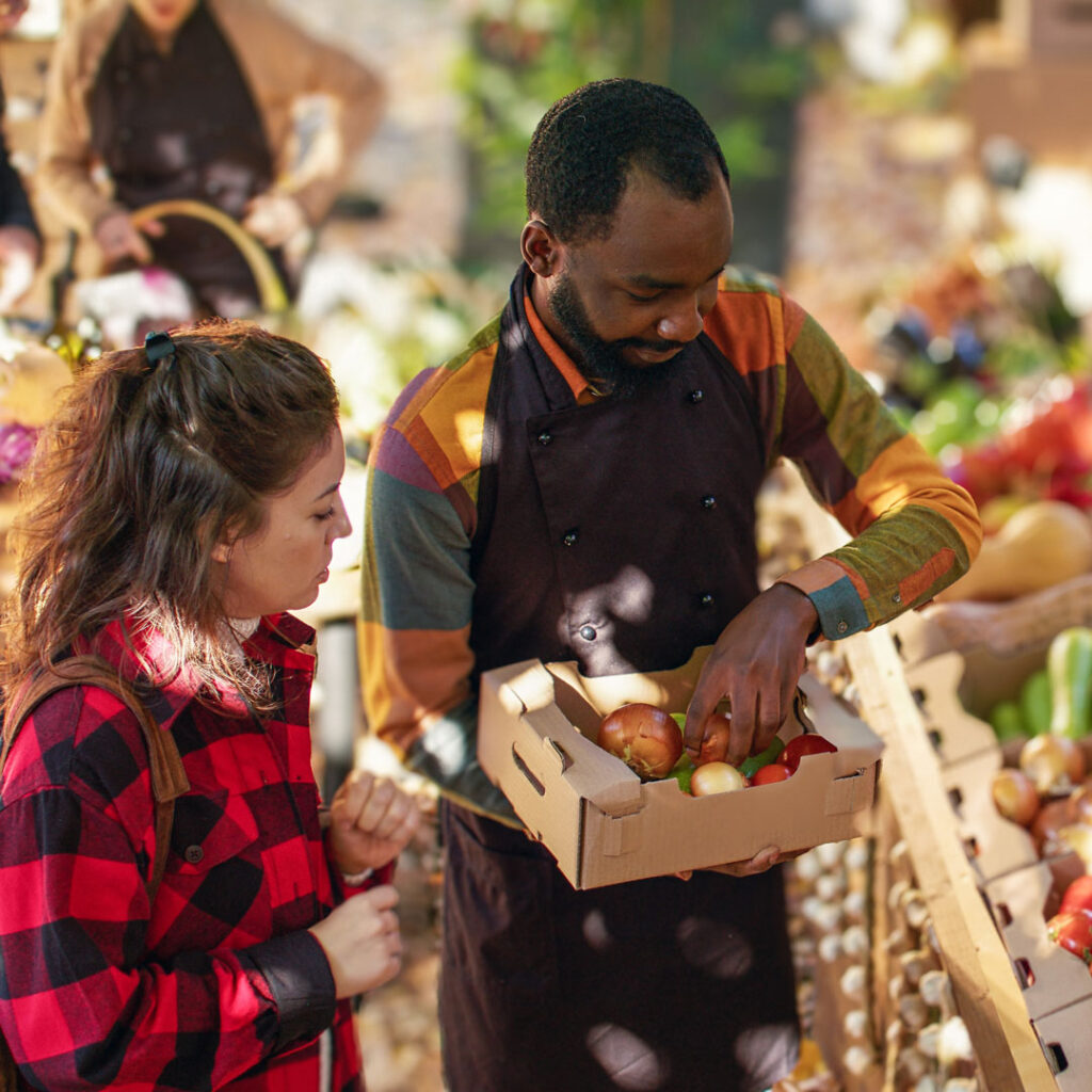 Photo of a vendor at a Farmer's Market